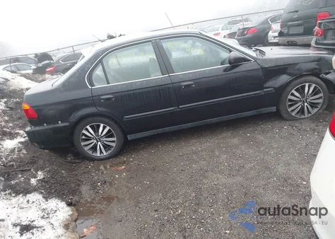 1999 Honda Civic Lx from USA, damaged, VIN 1HGEJ6678XL059012